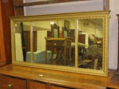 AN ANTIQUE GILT TRYPTCH OVERMANTEL MIRROR, W 129 CM