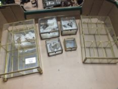 A COLLECTION OF GLASS DISPLAY BOXES CONTAINING MINIATURE ORIENTAL CERAMIC FIGURES