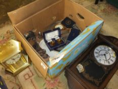 A BOX OF METALWARE AND CLOCK TO INCLUDE A PAIR OF DELTA GOLD PLATED STYLE NAPKIN RINGS