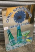 AN ORIGINAL VINTAGE MIRRORED BABYCHAM ADVERTISING CLOCK H 43 CM BY W 30 CM