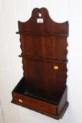 A VINTAGE OAK WALL HANGING RACK WITH TROUGH TO BASE, H 57 W 32.5 D 15 CM