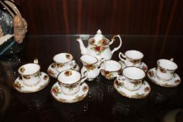 A ROYAL ALBERT OLD COUNTRY ROSES MINIATURE SIX PERSON TEA SET