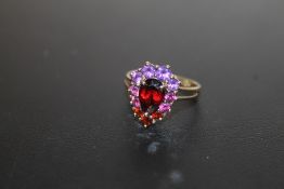 A 9 CARAT GOLD DRESS RING SET WITH ASSORTED COLOURED STONES, APPROX WEIGHT 2.8G