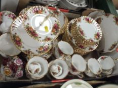 A TRAY OF ROYAL ALBERT OF COUNTRY ROSES CHINA TO INCLUDE A CAKE STAND, TRIOS, ETC