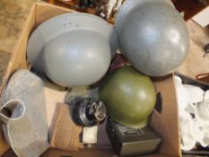 A BOX OF MILITARIA TO INCLUDE HELMETS , HIP FLASK ETC