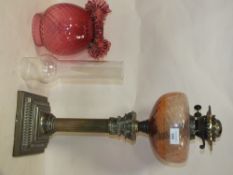 AN ANTIQUE COLUMN OIL LAMP WITH FRILLED PINK GLASS SHADE AND PINK GLASS FONT OVERALL HEIGHT