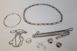 A BAG F STERLING SILVER JEWELLERY TO INCLUDE A BANGLE, CHAINS ETC.