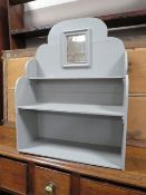 A SMALL PAINTED MIRRORED HANGING SHELF, W 55 CM