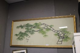 A FRAMED AND GLAZED ORIENTAL STYLE EMBROIDERED PICTURE