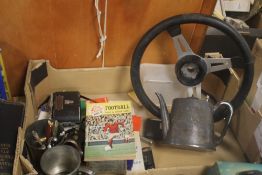 A TRAY OF COLLECTABLES TO INCLUDE A VINTAGE STEERING WHEEL, CAMERA ETC