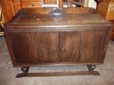 AN OAK VINTAGE SIDEBOARD
