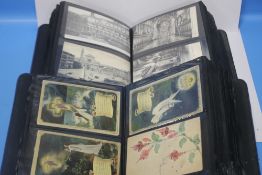 TWO ALBUMS OF POSTCARDS, GREETINGS CARDS ETC to include European views, humorous, Margaret Tarrant,