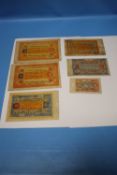 A COLLECTION OF SIX FOREIGN BANK NOTES