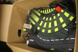 A BOX OF SCALEXTRIC TRACK
