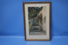 H PERCY HEARD FRAMED AND GLAZED WATERCOLOUR OF A COTTAGE AND GARDEN SIGNED LOWER LEFT 30 CM X 44.5