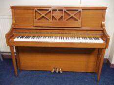 A TEAK PIANO WITH 88 KEYS MADE BY KNIGHT