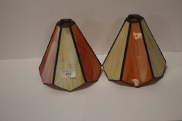TWO COLOURED GLASS SHADES