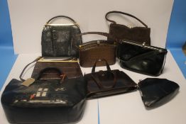 A BLACK LIZARD SKIN HANDBAG of unknown make together with a Meadows brown suede handbag and