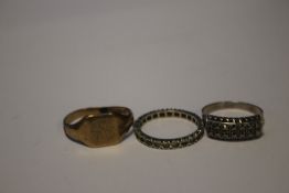 A WHITE METAL ETERNITY RING SET WITH WHITE STONES MARKED 9CT AND A 9CT GOLD SIGNET RING A/F TOGETHER