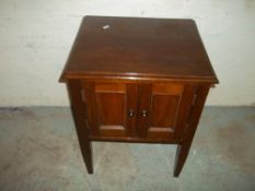 A SMALL HARRIMAN AND BROWN TWO DOOR SIDE CHEST