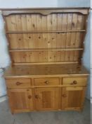 A SOLID PINE WELSH DRESSER, 138 CM WIDE