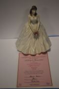 A ROYAL WORCESTER FIGURINE 