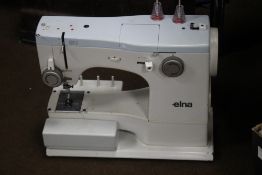 AN ELNA SEWING MACHINE
