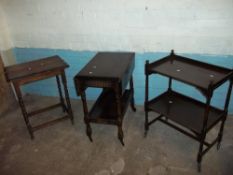 THREE ITEMS TO INCLUDE AN ANTIQUE BARLEY TWIST HALL TABLE AND TWO SERVING TROLLIES