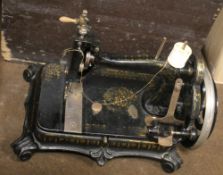 A VINTAGE BOXED SEWING MACHINE