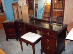 A STAG MINSTREL TRIPLE MIRROR DRESSING TABLE AND STOOL WITH A TWO DRAWER BEDSIDE CHEST