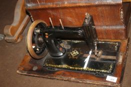A CASED SEWING MACHINE