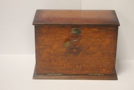 A SMALL FALL FRONT DESKTOP CABINET, with fitted interior