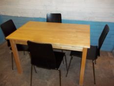 A MODERN KITCHEN DINING TABLE AND FOUR MATCHED CHAIRS
