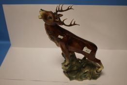 A CERAMIC MODEL OF A STAG