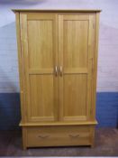 A MODERN OAK DOUBLE WARDROBE WITH LOWER DRAWER, MATCHES LOT 842