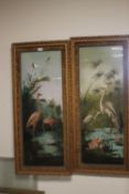 A PAIR OF VICTORIAN PICTURES OF BIRDS PAINTED ON GLASS ONE DEPICTING FLAMINGOS THE OTHER OF STORKS
