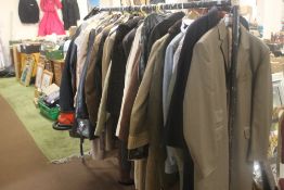 A LARGE QUANTITY OF CLOTHING, MOSTLY MEN'S SIZE LARGE