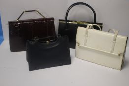 A VINTAGE EROS RED LEATHER HANDBAG together with a black Ackery leather handbag and a navy blue