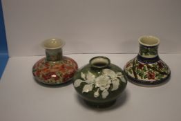 A COBRIDGE FLORAL VASE TOGETHER WITH TWO OTHER VASES