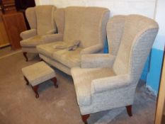 A MODERN FOUR P[IECE SUITE - TWO SEATER AND TWO CHAIRS AND ADJUSTABLE FOOT STOOL WITH QUEEN ANNE