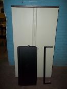 A TRIUMPH STEEL LOCKING CABINET FOR STORAGE