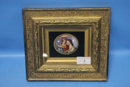 A SMALL FRAMED CERAMIC PLAQUE DEPICTING 2 CLASSICAL STYLE FIGURES 22.5 CM X 20 CM