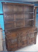 A DARK OAK WELSH DRESSER / SIDEBOARD UNIT