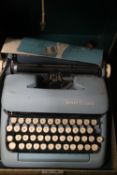 A SMITH CORONA TYPE WRITER