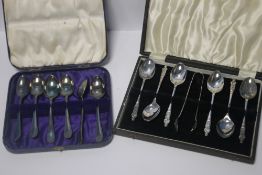 TWO CASED SETS OF WHITE METAL TEASPOONS