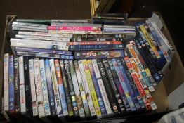 A TRAY OF ASSORTED DVDS (TRAY NOT INCLUDED)