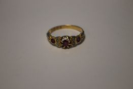AN 18 CT GOLD LADIES RUBY AND DIAMOND ? RING APPROX 2.4 GRAM