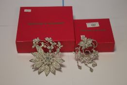 BUTLER AND WILSON TWO BOXED WHITE STONE BROOCHES