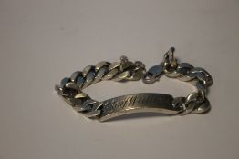 A SILVER CURB LINK IDENTITY BRACELET APPROX 98.4 GRAM
