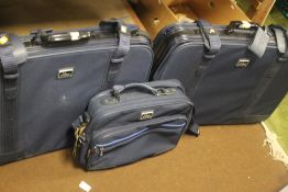 THREE ASSORTED SUITCASES